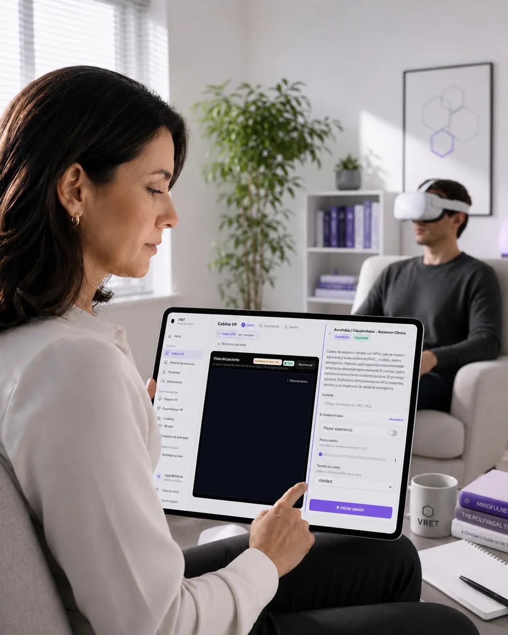 Virtual reality exposure therapy software in use: a clinician paces a session from the control cabin on her tablet while the patient, seated across from her, wears a Meta Quest headset.