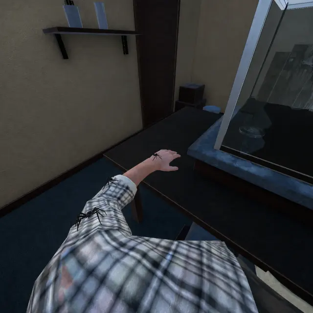 Spiders on a virtual arm beside a glass container